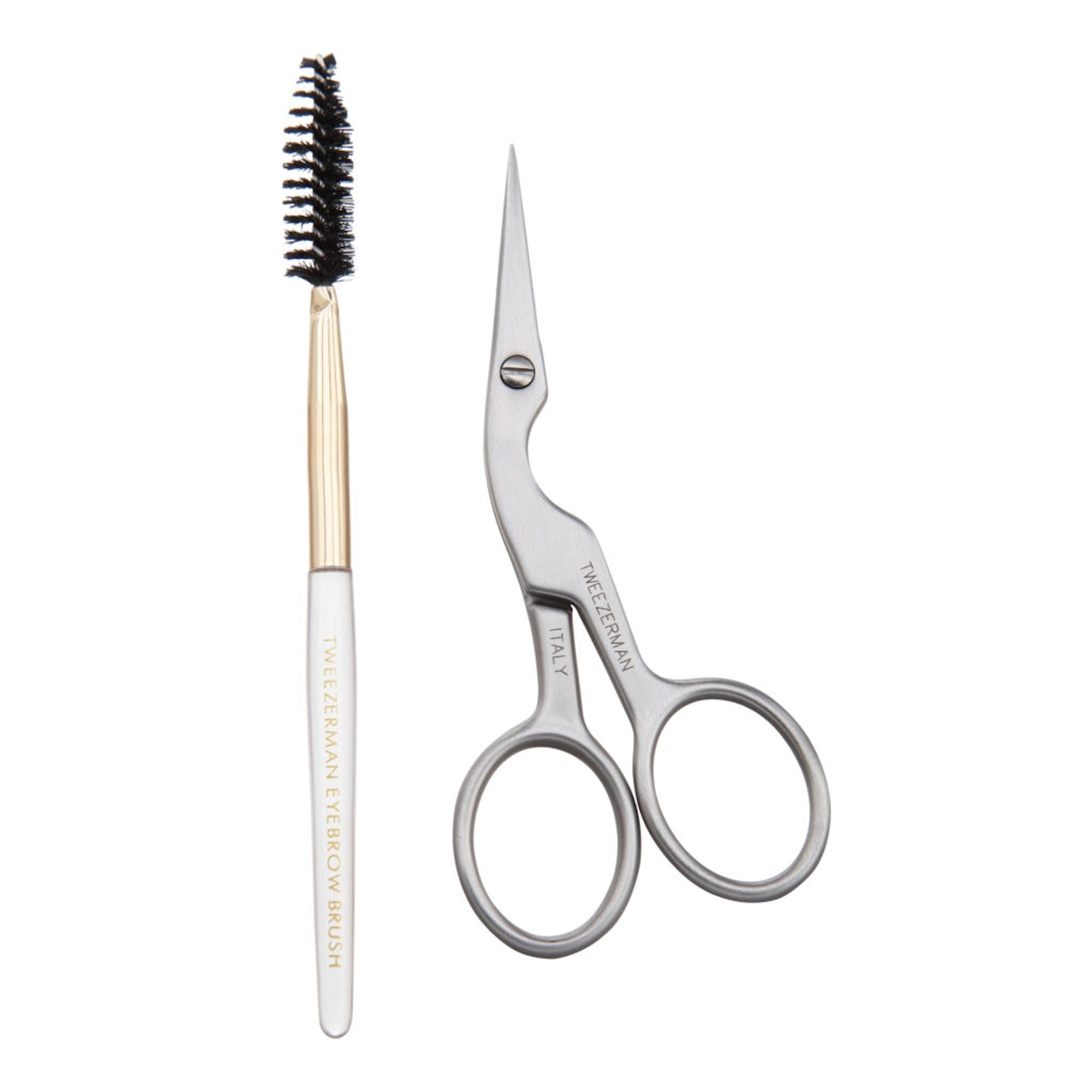 Tweezerman brow scissors with brush for precise shaping and grooming of eyebrows, featuring sharp blades and a cleaning brush.