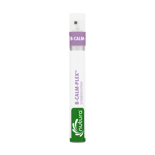 Nutura Vitaminesprays B-CalmPlex multivitamin spray bottle, 14.4ml, with colorful label and spray nozzle visible.