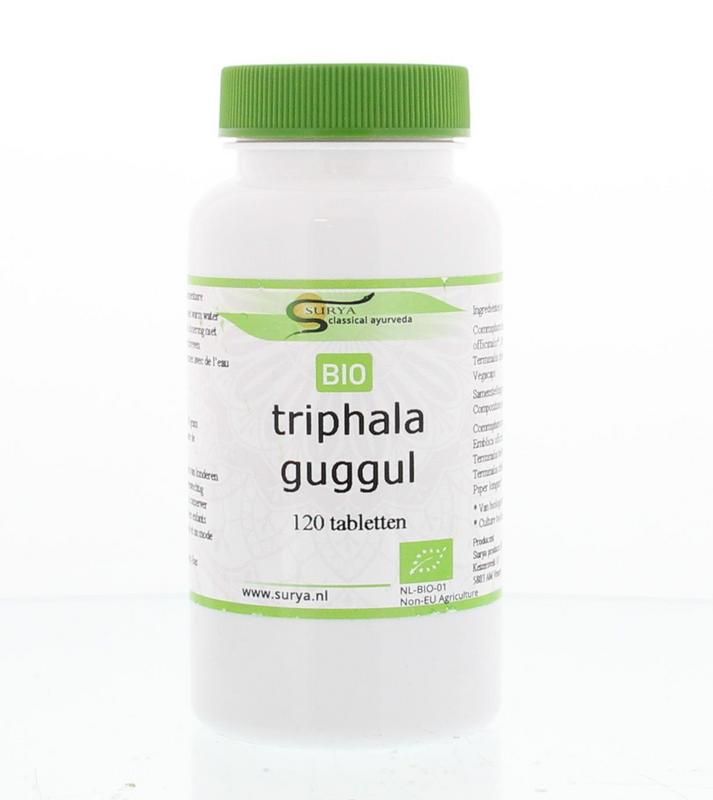 Bottle of Surya Bio Triphala Guggul herbal tablets in a clear container with a label, showing the product inside.