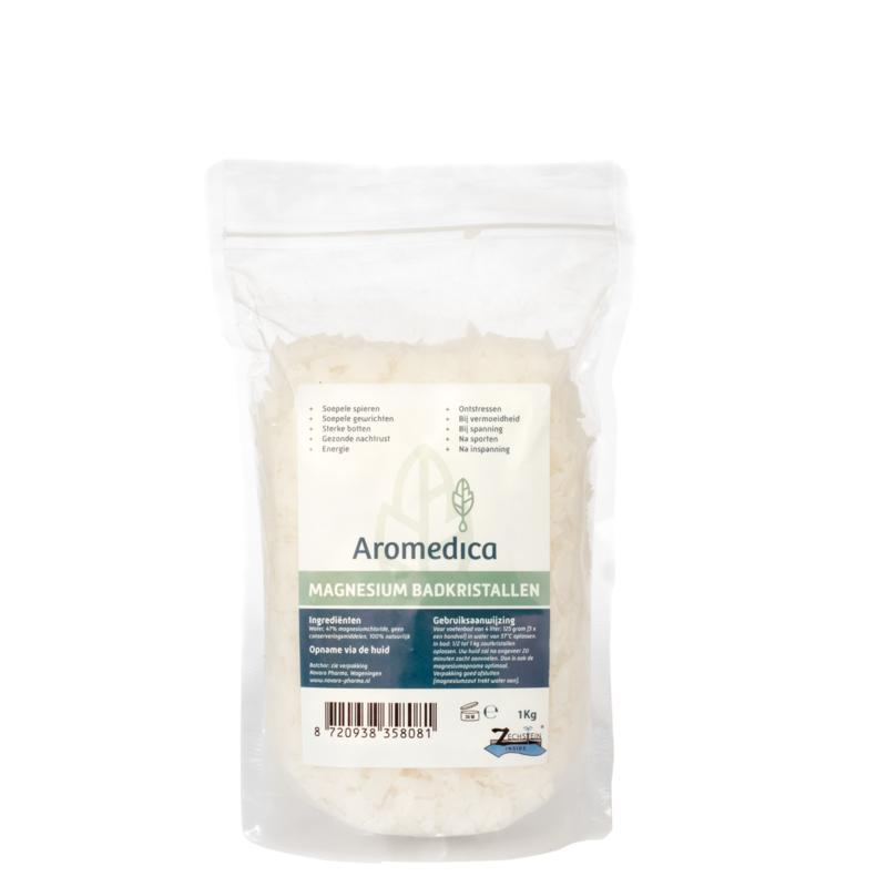 Aromedica Magnesium bath crystals in a 1kg bag, shown in a close-up of the product packaging for bath and shower use.