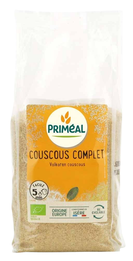Whole wheat couscous by Primeal, 500g, in a clear package, showing the golden grains of organic pasta and rice mix.