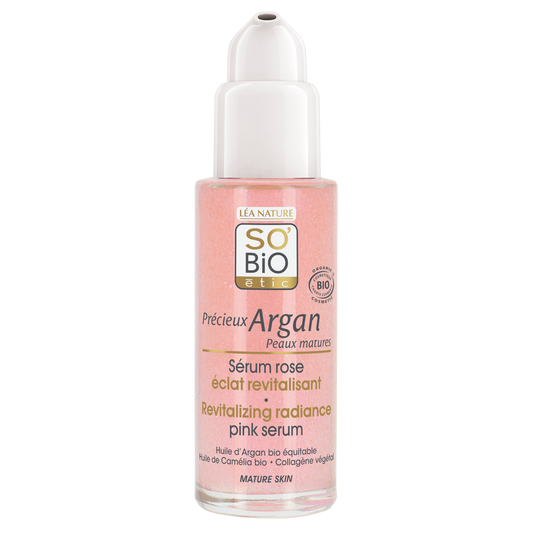 So Bio Etic revitalizing radiance serum in pink bottle, 30ml, facial skincare product with a sleek design and vibrant packaging.