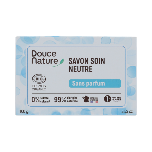 Douce Nature unscented, fragrance-free soap bar, 100g, natural cleansing soap with simple packaging and a white soap bar.