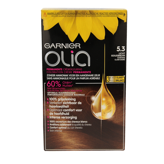 Garnier Olia 5.3 golden brown hair coloring kit with applicator and gloves for at-home hair dye application.