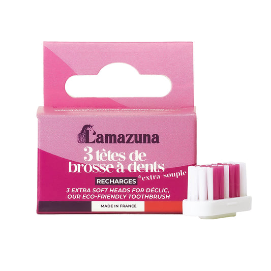 Set of three Lamazuna XS toothbrush heads for electric toothbrushes, with white bristles and compact design.