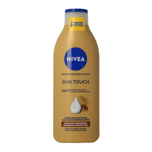 Nivea Bodylotion Sun Kissed Radiance Light in 400ml bottle, creamy moisturizing body care product with a smooth texture.