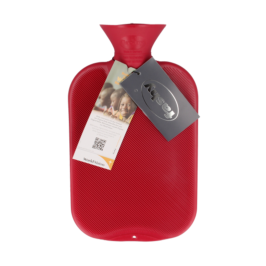Fashy cranberry-colored 2-liter warm water bottle with ribbed design, made for soothing comfort and heat retention.