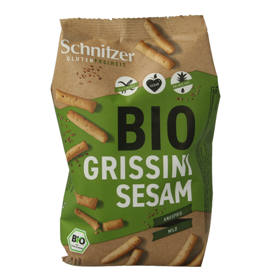 Sesame gluten-free bio Schnitzer Grissini snack sticks in 100 grams package, crispy Italian breadsticks with sesame seeds.