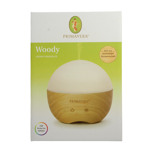 Primavera Aroma diffuser with woody design, showcasing a bottle of Primavera essential oils for aromatherapy.