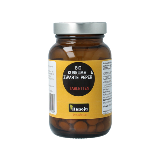 Hanoju Kurkumapoeder + piperine supplement, 500mg bio tablets, herbal remedy for wellness, showing the product packaging and tablets.