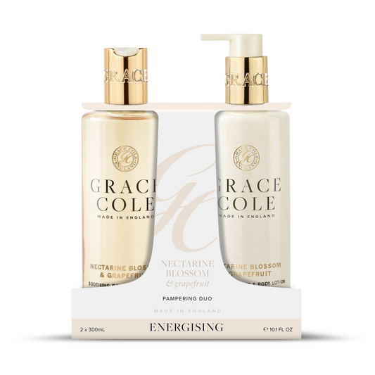Grace Cole Nectarine Blossom & Grapefruit body care duo with two bottles, featuring floral and citrus scents in sleek packaging.
