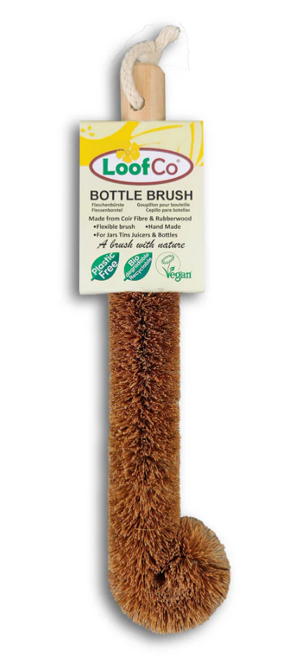 Eco-friendly Loofco coconut bottle brush for cleaning bottles and jars, made from natural coconut fibers.