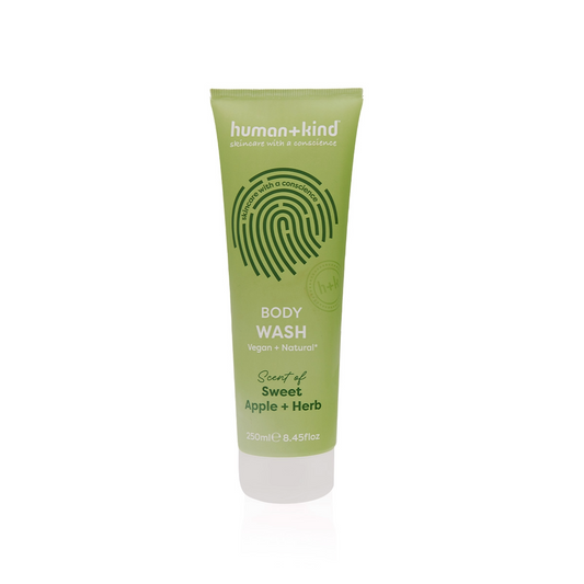 Human+Kind 2-in-1 apple herbs vegan body wash bottle, showing the product label and packaging design.
