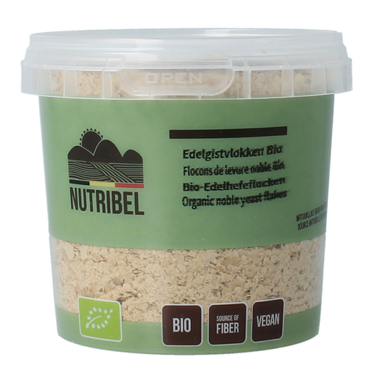 Nutribel Edelgistvlokken bio, 100g, raw superfood with golden flaxseed flakes in a clear package, ideal for healthy diets