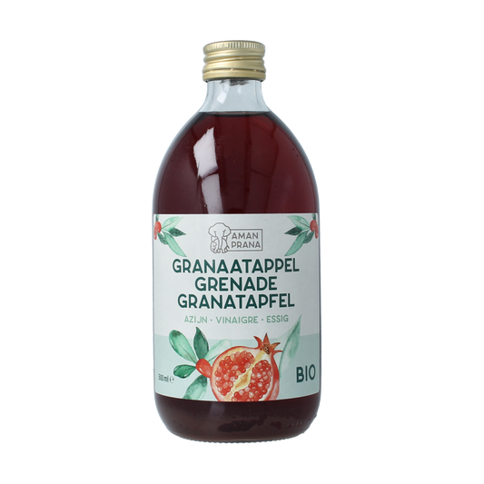 Amanprana organic pomegranate vinegar bottle, 500ml, with clear label showing the product name and branding.