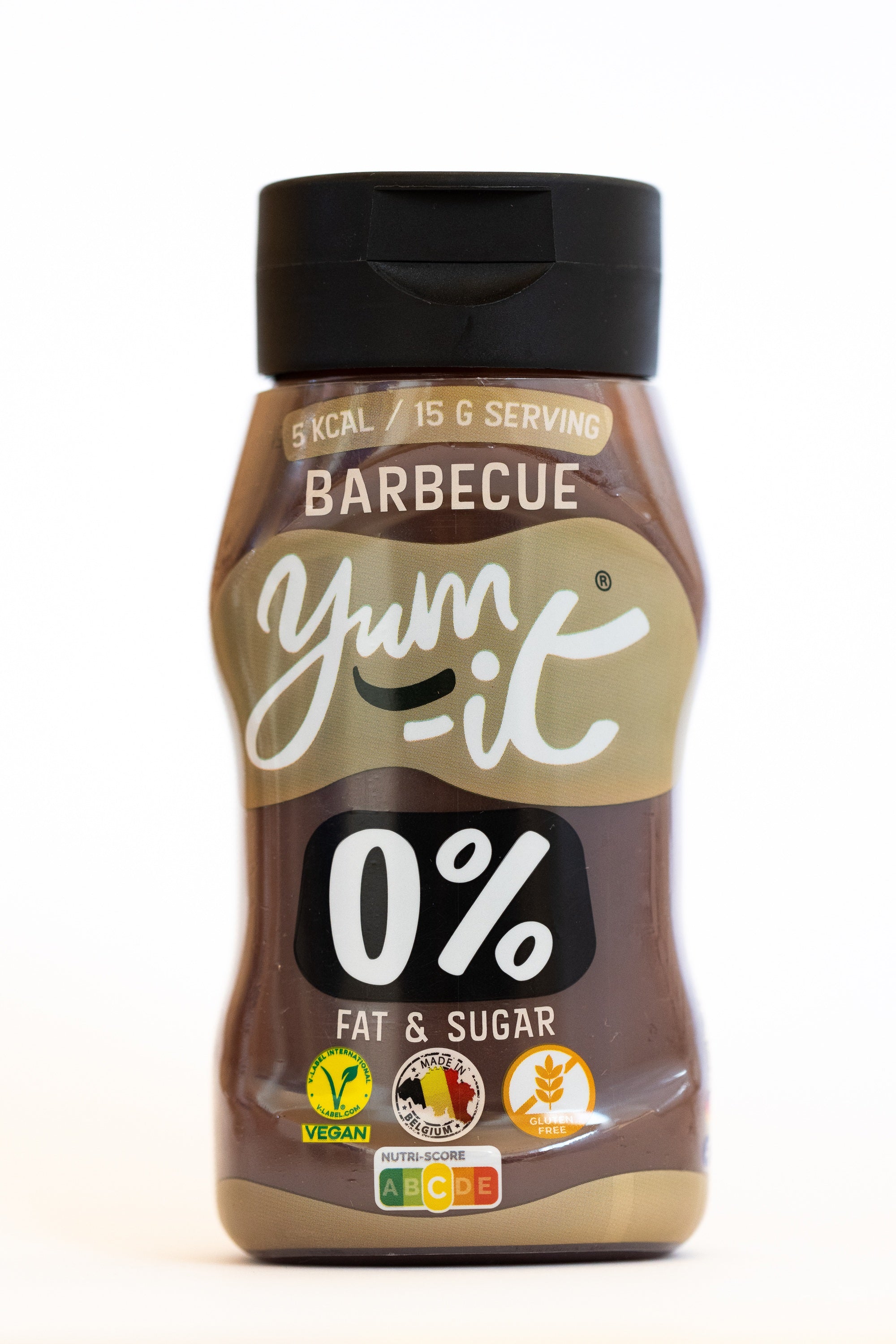 Yum-It Barbecue sauce 300g jar, creamy texture, label with red and yellow design, placed on a wooden surface.