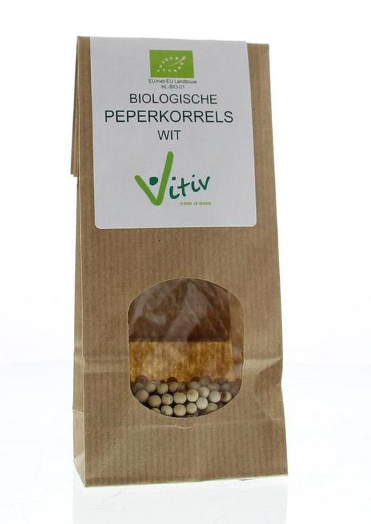 Vitiv organic white peppercorns in a 40g container, displayed with fresh peppercorns and herbs on a kitchen surface.