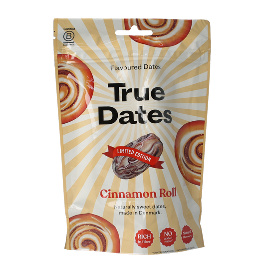 True Dates cinnamon roll, 100g, with a golden-brown exterior and visible cinnamon swirls, made from fresh dates and dough.