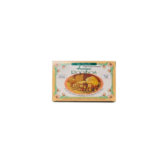 Annique Rooibosthee tea bags, 80-count, in a box of koffiem en thee products, with rooibos tea leaves visible in the packaging