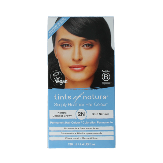 Tints Of Nature 2N zeer donkerbruin hair coloring set with natural ingredients, featuring hair dye bottles and application tools.