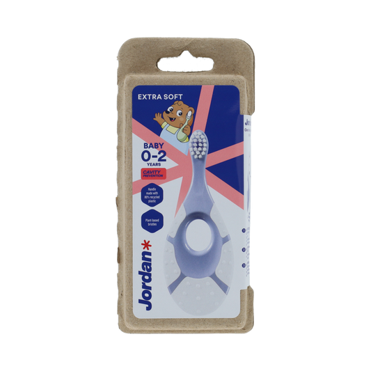 Jordan Baby Clean Smile Care extra soft toothbrush for babies, showing soft bristles and small handle for gentle cleaning.