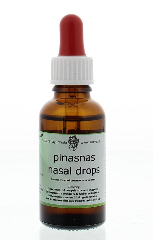 Surya Pinasnas nasal drops in a 30ml bottle, used for nasal care and inhalation, with a white and blue packaging design.