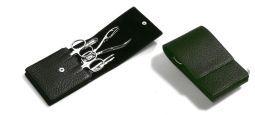 Malteser manicure and pedicure set with five tools in a compact case, ideal for personal grooming and nail care.