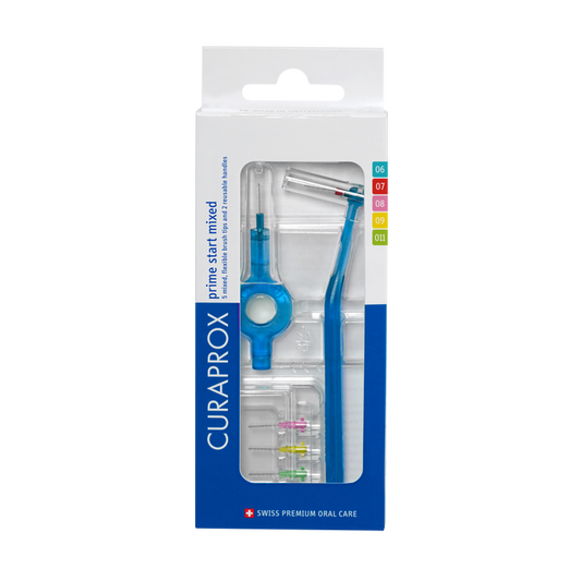 Curaprox CPS Prime Start mixed oral care set with various dental tools, designed for comprehensive mouth hygiene.