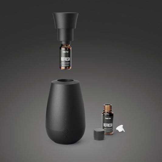 Stadler Ella black diffuser with one scent dispenser, featuring a sleek black design for aromatic room fragrance.