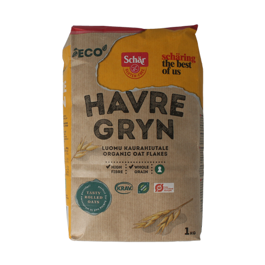 Schar gluten-free organic oatmeal breakfast cereal in 1 kg package, showing a bowl of oats and the product packaging.