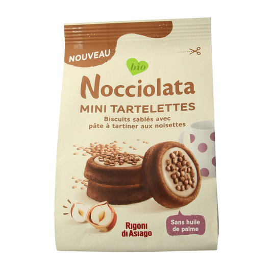 Rigoni Di Asiago Nocciolata bianca tartlets, bio almond-filled cookies in a 250g package, displayed on a plate.