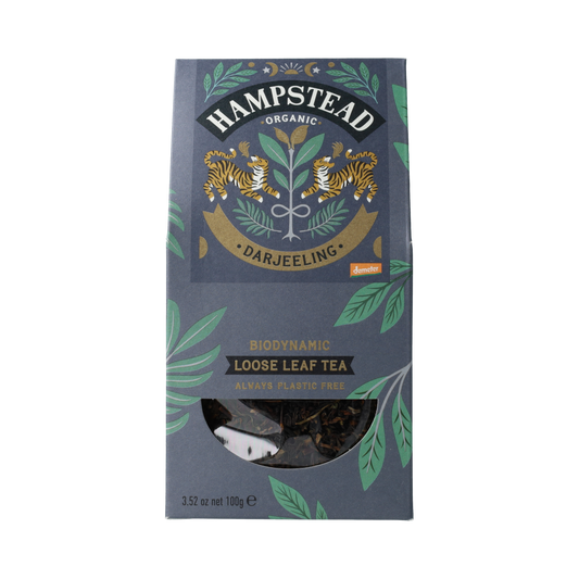 Hampstead Darjeeling loose organic Demeter tea in a 100g package, showcasing the tea leaves and packaging.