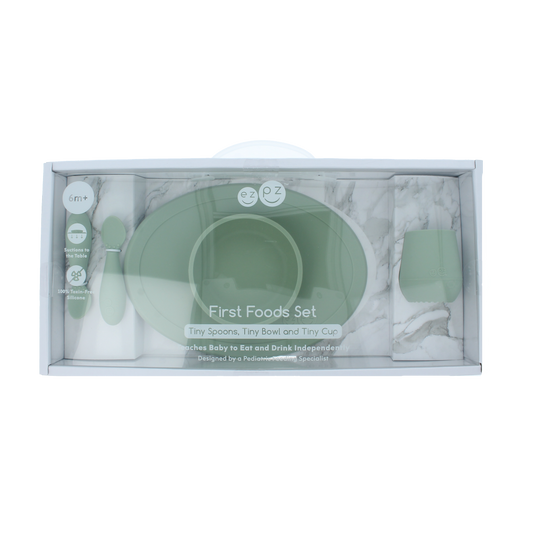 ezpz first food set in sage for babies and toddlers, includes plates, bowls, and utensils, designed for easy feeding at home.