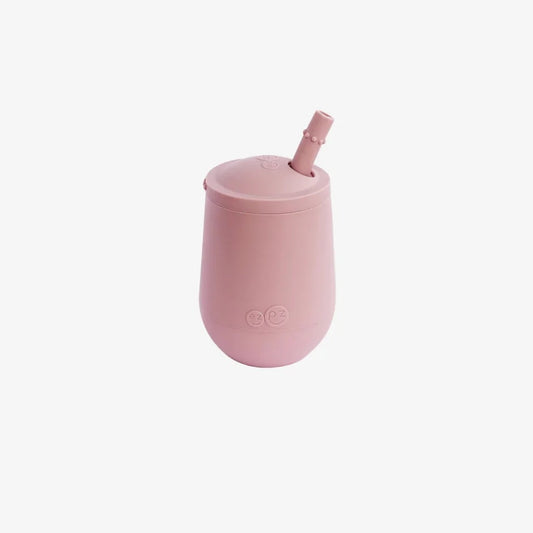 ezpz Mini Cup and straw training system in blush, designed for babies and toddlers, with a close-up of the cup and straw.