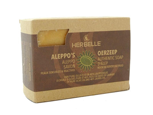 Herbelle Aleppo olive soap with 40% laurel, rectangular bar with textured surface, natural ingredients, and branding details visible.