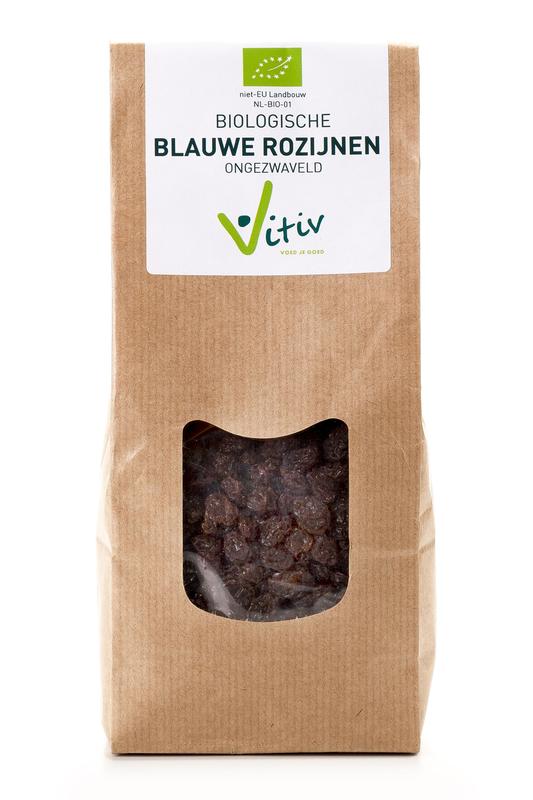 Vitiv Blauwe rozijnen klein bio in 1kg package, dried fruit, organic blue raisins, displayed in a bowl with some scattered around.