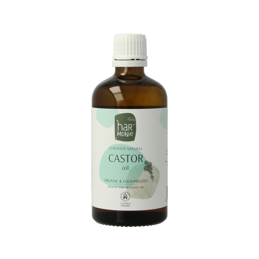 Harmonie castor olie in 100ml bottle, natural body care product with a clear label and cap, on a white background.
