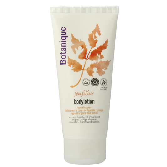 Botanique Bodylotion sensitive 200ml bottle showing the label and creamy texture for gentle skin hydration.