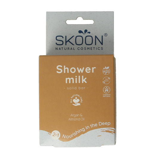 Skoon Solid shower milk nourishing into the deep 2-in-1 Bad en Douche bar, 90g, with creamy texture and natural ingredients.