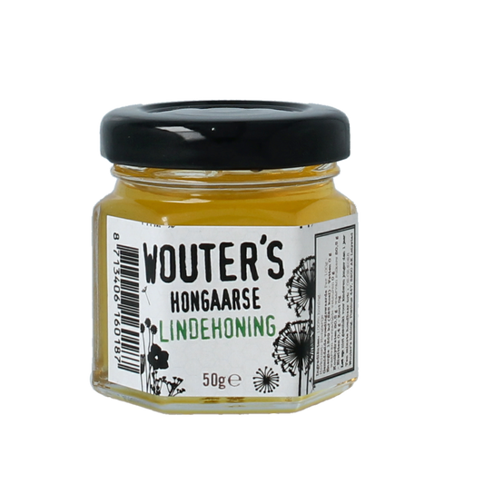 de Traay Wouters Hongaarse lindehoning 50g jar showing golden honey with label and wooden honey dipper