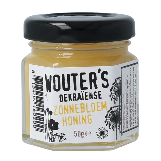 De Traay Wouters Oekraiense zonnebloemhoning in 50g jar, showcasing golden honey with sunflower pollen texture.