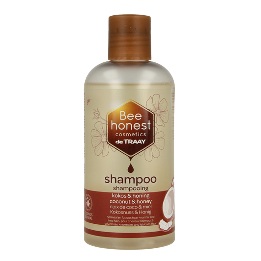 Traay Bee Honest kokos en honing shampoo voor haarverzorging, 250 ml fles with natural ingredients and product label
