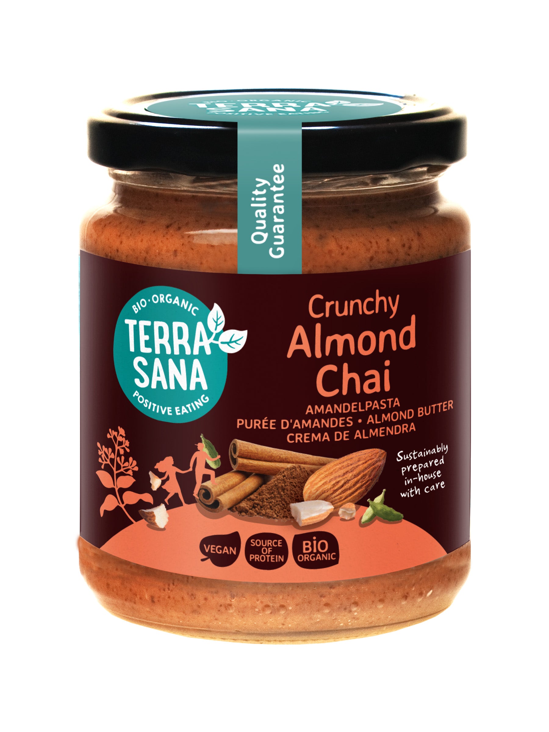 Crunchy TerraSana almond chai spread on bread, organic almond paste with chai flavor in a 250g jar.