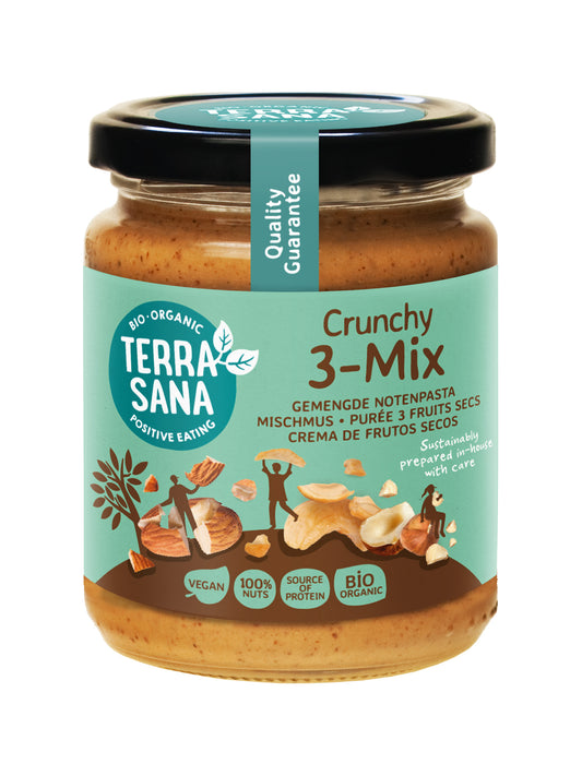 TerraSana 3-Mix crunchy bio notenpasta spread on bread, 250g, with mixed nuts visible in the crunchy texture.