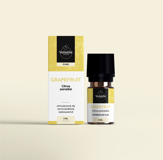 Volatile Grapefruit essential oil bottle, 5ml, from Volatile, with clear label and amber glass container showing citrus scent.