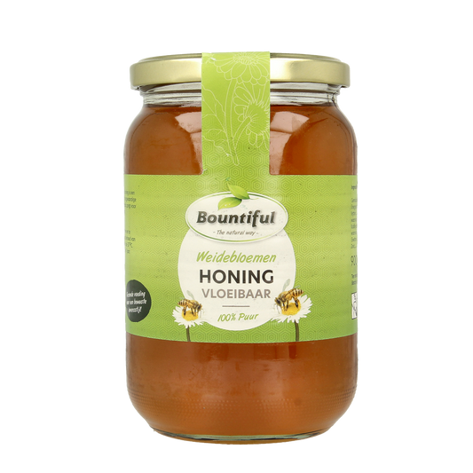 Bountiful Weidebloemen honing in a 900g jar, showcasing golden liquid honey from meadow flowers with a natural, smooth texture.