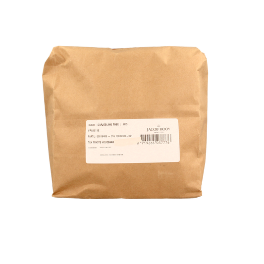 Jar of Jacob Hooy Darjeeling tea in a 1kg package, showcasing the tea leaves and product packaging.