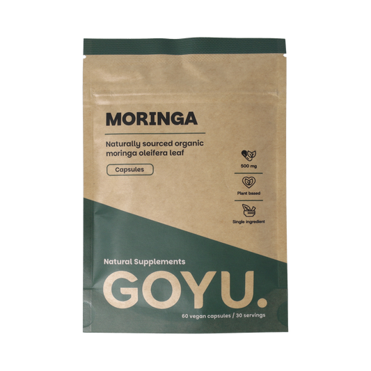 Goyu Moringa oleifera 500mg vegetarian capsules, dietary supplement in a clear bottle with label showing green Moringa leaves.