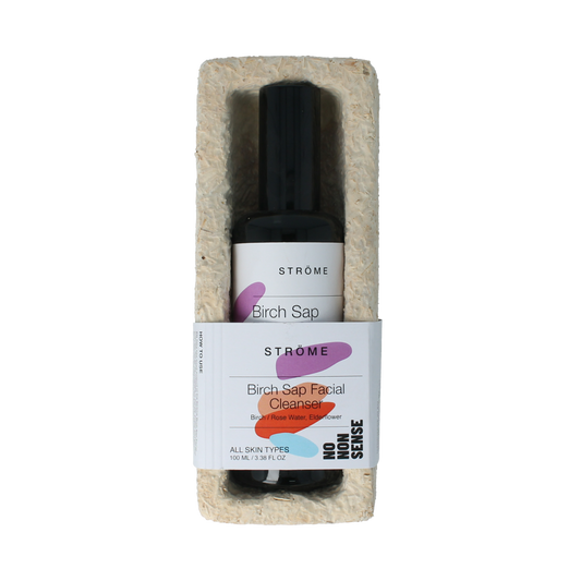 Ströme Birch Sap Facial Cleanser in 100ml bottle showing the clear liquid and minimalist packaging for natural skincare.