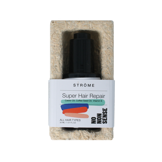 Ströme Super Hair Repair Bio bottle with 30ml label, showcasing hair care product in a sleek packaging.